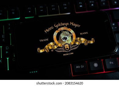 Viersen, Germany - June 9. 2021: Closeup Of Mobile Phone Screen With Logo Lettering Of Film Production Metro Goldwyn Mayer Company On Computer Keyboard (focus On Center Of Upper Lettering)