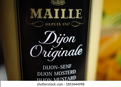 Viersen, Germany - May 2. 2020: Close Up Of Maille Dijon Originale Mustard Bottle Label (selective Focus On Center Of Bottle)