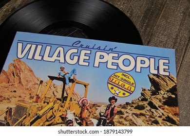 Viersen, Germany - May 9. 2020: Close Up Of Vintage Vinyl Record Cover Of Disco Band Village People With Hit YMCA (focus On Center)