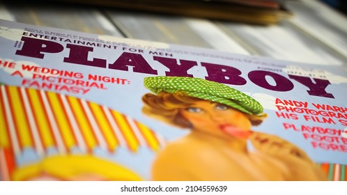 Viersen, Germany - May 9. 2021: Closeup of old cover of paper print magazine playboy from seventies (selective focus on center of letter Y in center)
