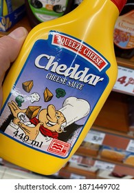 Viersen, Germany - October 8. 2020: Close Up Of Squeeze Cheese Cheddar Sauce Bottle In Shelf Of German Supermarket (focus On Center Of Logo)