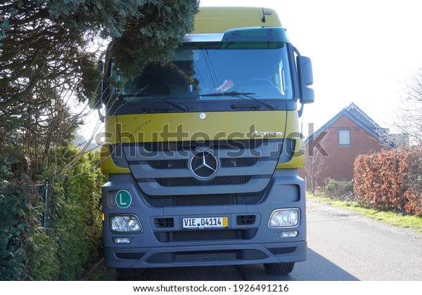 Viersen,German-Febuary\
28,2021:The Mercedes-Benz Actros truck parks on the road,  is a\
heavy-duty truck introduced by Mercedes-Benz at the 1996 Commercial\
Vehicle IAA in Hanover, Germany\
