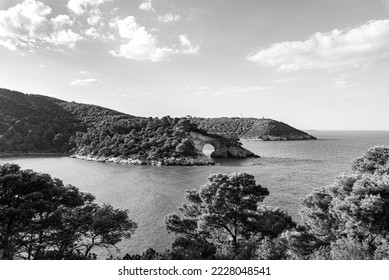 Vieste, Italy. View of the bay and the Arch of San Felice near Vieste, on a summer day. Black and white image. September 9, 2022. - Shutterstock ID 2228048541