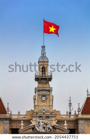 Vietnam flag on the top of People's Committee Building, Ho Chi Minh City, Vietnam