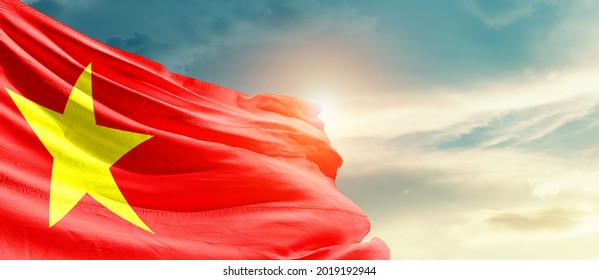Vietnam national flag waving in beautiful sky.
