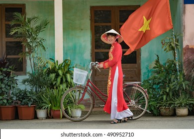 Vietnam,Beautiful Woman In Ao Dai Vietnam Traditional Dress