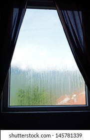 Vietnamese City Through Wet Window