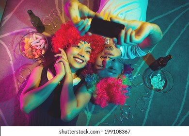 Vietnamese Couple Taking A Selfie At The Party