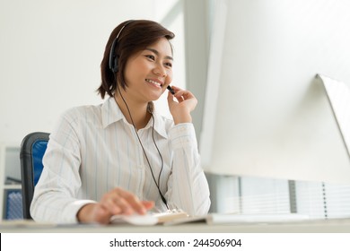 Vietnamese Customer Service Representative Working In The Office