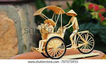 Vietnamese cyclo handmade  model. Bicycle-taxi.