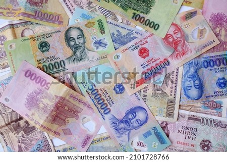 Vietnamese dong banknotes close-up. Money background. Vietnamese currency - dongs. Pattern texture and background of Vietnam dong money, currency banknotes ready for exchange and business investment.