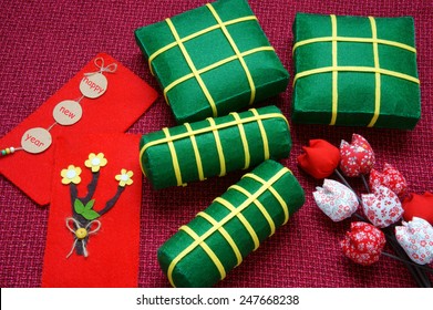 Vietnamese food, banh chung, banh tet are traditional eating on Tet holiday, wrap in green leaf. When spring come, on Vietnam Lunar New Year , people worship the ancestor with glutinous rice cake