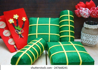 Vietnamese food, banh chung, banh tet are traditional eating on Tet holiday, wrap in green leaf. When spring come, on Vietnam Lunar New Year , people worship the ancestor with glutinous rice cake