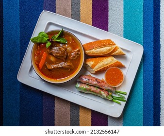 Vietnamese Food Beef Stew with French Bread and Spring Rolls