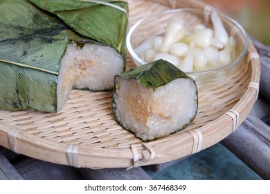 Vietnamese food for Tet holiday in spring, banh chung is traditional food on lunar new year, a rice cake stuffed with pork, green bean, is tradition culture in spring