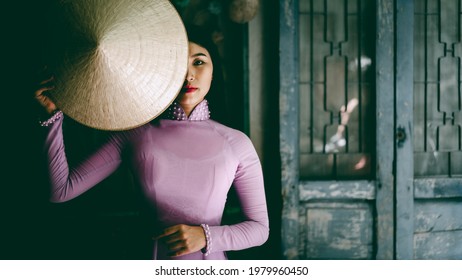 Vietnamese lady with Ao Dai Vietnam traditional dress, Vietnam