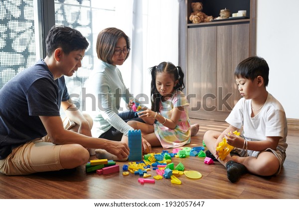 Vietnamese Parents Children Sittig On Floor Stock Photo (Edit Now ...