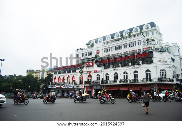 Vietnamese people riding biking driving and\
foreign travelers travel visit old town and shopping local product\
in Dong Kinh Nghia Thuc Square at Hoan Kiem district on July 7,\
2012 in Hanoi,\
Vietnam