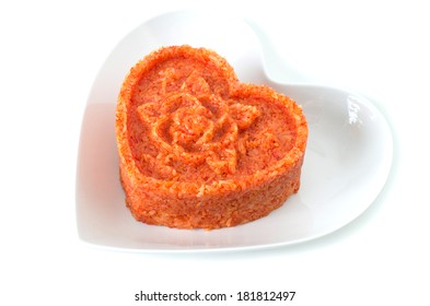 Vietnamese red glutinous sticky rice, xoi gac forming heart shape