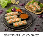 Gỏi cuốn, Vietnamese spring rolls, summer spring rolls, or salad spring rolls, a traditional dish in Vietnamese cuisine consisting of chicken, shrimp, vegetables, bún, and other ingredients wrapped in