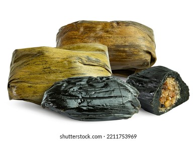 Vietnamese sticky rice cake (or Banh It La Gai).Vietnam Traditional cake made of rice flour mixed with thorn leaf paste, mung beans and wrapped in many layers of banana leaves - Shutterstock ID 2211753969