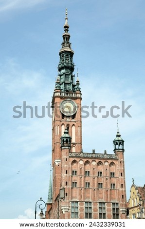The view of 15th century historic Gdansk Town Hall with a clock tower reaching 83 meters height (Poland).