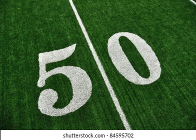 View From Above Of 50 Yard Line On American Football Field With Artificial Turf