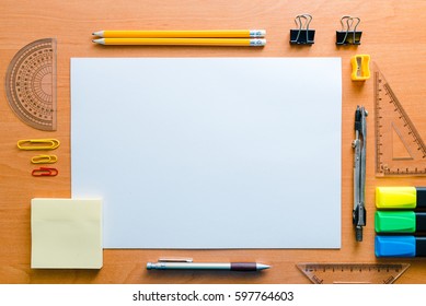 View From Above. Artistic Work Tools On White Wooden Table. 