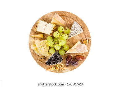 View From Above At Cheese Plate With Grape And Dry Fruits