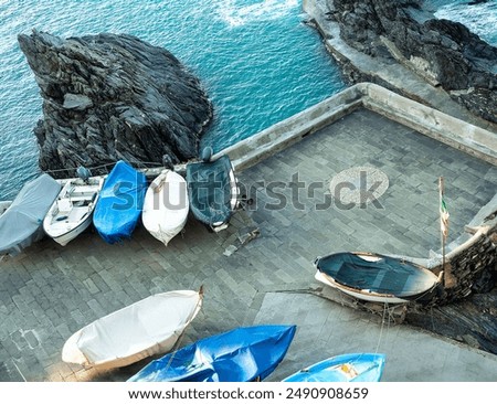 Similar – Image, Stock Photo Manarola is one of the most beautiful villages in Italy. The Cinque Terre is a rugged coastline of the Ligurian Riviera and is made up of five beautiful hilltop villages.