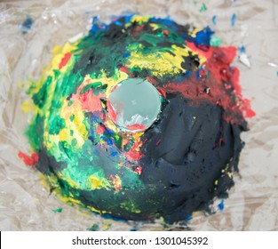 View From Above Of Colourful Hand Painted Plaster Volcano For Science Experiment.