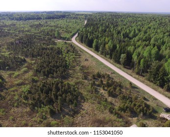 view from above: drone photography, Bird's-eye view, road forest and grass, Lithuania lanscape,