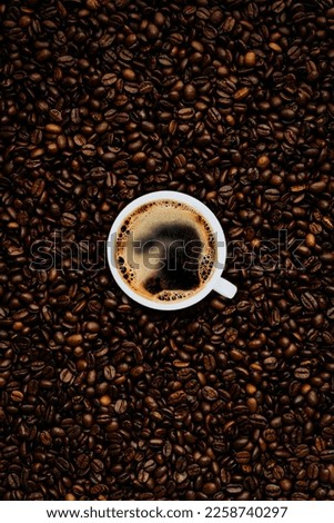 
View from above, High Quality Colombian Coffee Beans, with full hot cups.