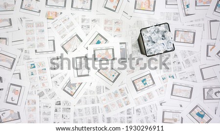 A view from above of a large table that is stuck on a story board sheets.