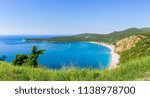 View from above on Adriatic sea coastline and Jaz beach at Montenegro, nature landscape, vacations to the summer paradise, panoramic view.