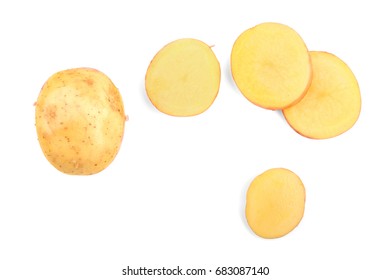 A View From Above On Uncooked Bright Cut Potatoes Isolated On A White Background. A Whole Potato And Perfectly Chopped Pieces Full Of Nutritious Starch. Autumn Ingredients For Homemade Meals. 