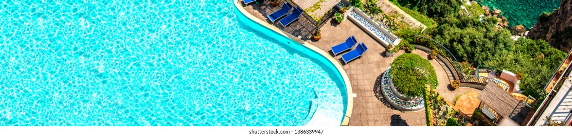 View From Above Panoramic Image Luxury Villa With Big Swimming Pool, Empty Sunbeds Rich Home On The Hill Of Rocky Coast Mediterranean Sea Turquoise Water, Via Nastro Azzurro. Positano, Amalfi Coast
