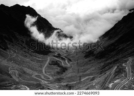 Similar – Serpentinen der alten Straße über den Gotthardpass in den Schweizer Alpen