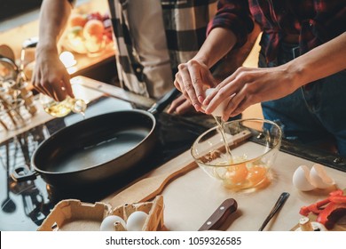 View From Above Picture Of Broken Egg Flows Into A Bowl