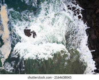 View From Above. Rushing Sea Water And Rocky Shore. Abstraction. There Are No People In The Photo. The Beauty Of The Wild. Ecology, Environmental Protection, Geology, Weather.