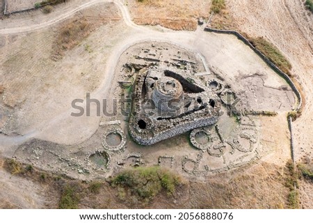 View from above, stunning aerial view of the ancient Santu Antine Nuraghe. Santu Antine Nuraghe is one of the largest Nuraghi in Sardinia, Italy. Stock photo © 