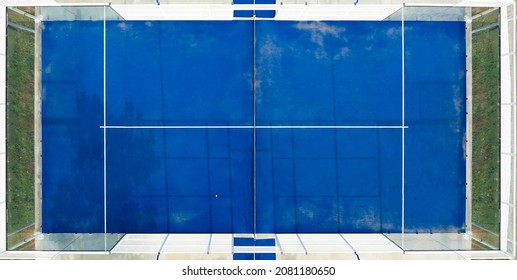 View From Above, Stunning Aerial View Of An Empty Blue Padel Court. Padel Is A Mix Between Tennis And Squash. It's Usually Played In Doubles On An Enclosed Court.