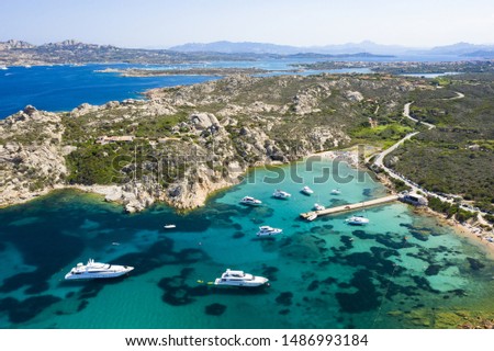 View from above, stunning aerial view of the Maddalena archipelago in Sardinia with beautiful bays of turquoise sea. Maddalena Arcipelago National Park, Sardinia, Italy.