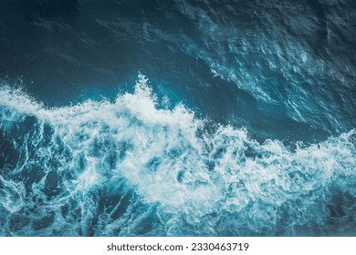 View from above turquoise ocean waves background. - Powered by Shutterstock - Get 15% off with code: PIKWIZARD15