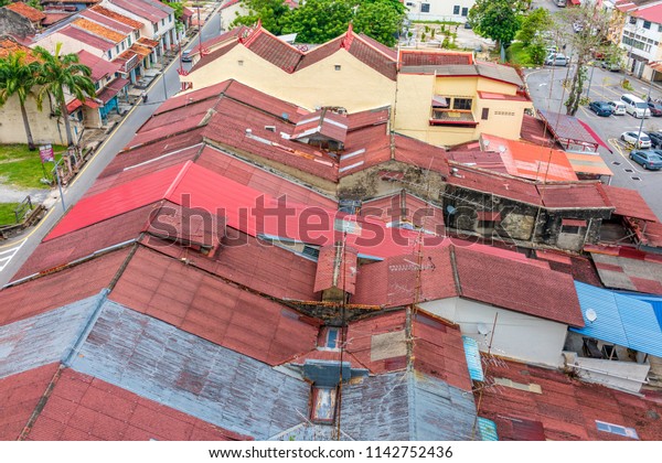 View from above of the  zinc roofs of the\
old houses in Melaka, Malaysia on May 20\
2018