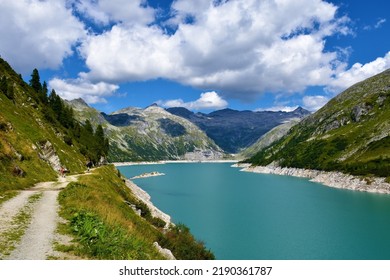 View of Kölnbreinspeicher accumulation lake in High Tauern mountains in Carinthia, Austria with Weinschnabel and Lausnock mountain peaks