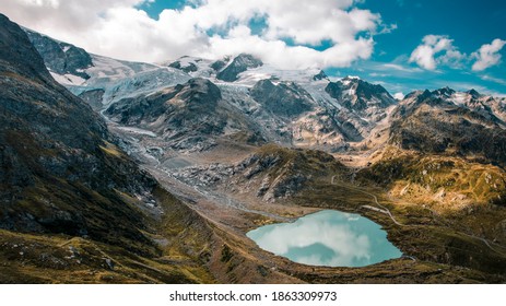 View across a glacial lake from Susten Pass in Switzerland near Andermatt - Shutterstock ID 1863309973