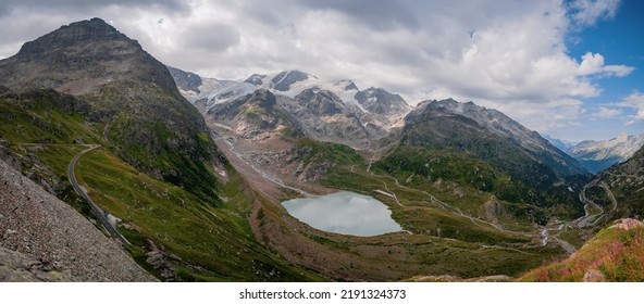 View across a glacial lake from Sustenpass in Switzerland near Andermatt. Landscapes of the mountains and the nature of the Susten region. - Shutterstock ID 2191324373