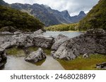 View across the glacial rocks by lake Mackenzie on the Routeburn track