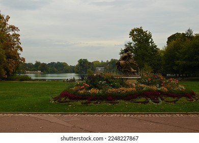 A view across the lake at the Parc de la Tete D’Or during early autumn in the French city of Lyon. 